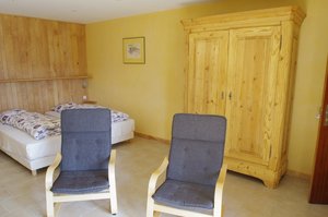 La chambre à coucher du gîte à louer Frêne